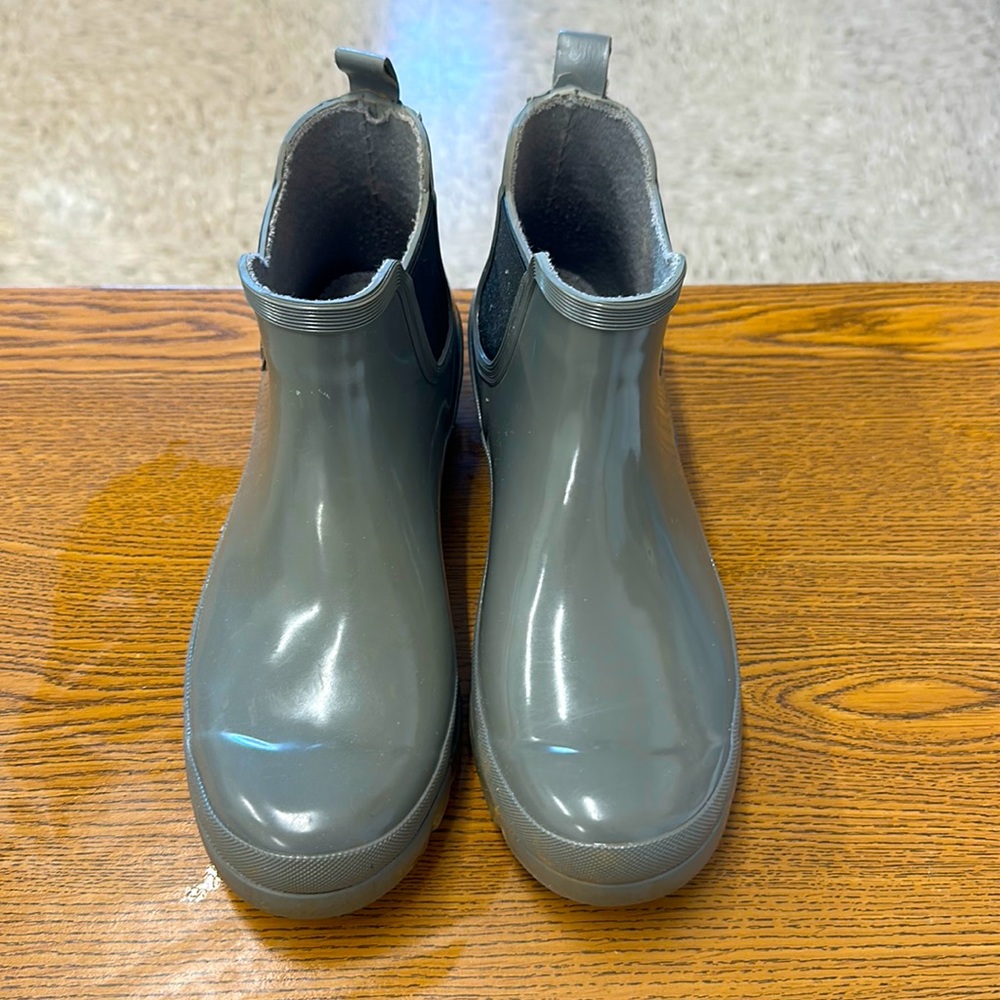 Womens grey POLAR brand rain boots.